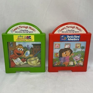 Fisher-Price 2002 Learn Through Music Elmo Scavenger Hunt Dora's Farm Cartridge - Picture 1 of 5