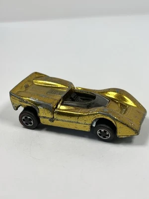 Coche fundido a presión Hot Wheels Redline McLaren M6A 1968 interior dorado negro vintage Foto 1 de 4