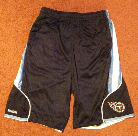 TENNESSEE TITANS REEBOK NFL (YOUTH SIZE XL 18/20) BLUE SHORTS WITH POCKETS Cover