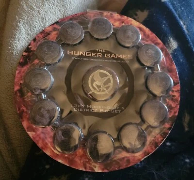 Hunger Games 13 Piece Button Set: Officially Licensed Unopened Box Brand New - Image 1 of 2
