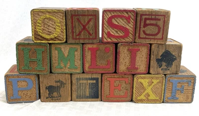 Juguetes de aprendizaje de 15 bloques de madera de los años 50 letras números y animales de los años 50 de varias caras Foto 1 de 4