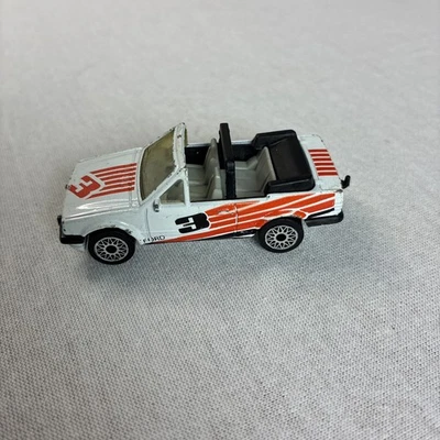 Винтажный спичечный коробок - 1985 FORD ESCORT CABRIOLET (БЕЛЫЙ) - Изображение 1 из 4