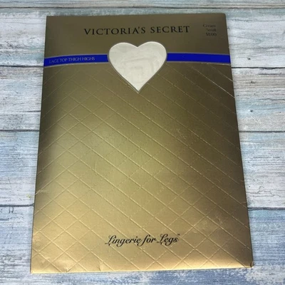 Medias de nailon crema hasta los muslos Top Victoria's Secret vintage pequeñas EE. UU. Mob Foto 1 de 4