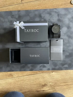 Reloj de vestir Tayroc cara negra con pulsera de acero inoxidable negro nunca usado Foto 1 de 2
