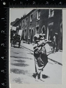 VINTAGE POSTCARD LONDON EAST END STREET SCENE BAREFOOTED GIRL WITH TODDLER - Picture 1 of 2