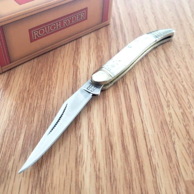 Navaja de bolsillo palillo de dientes para bebé Rough Ryder hoja de acero inoxidable mango de hueso blanco Foto 1 de 4