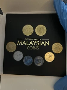 Terza serie di monete malesi 2014 commerciali  - Foto 1 di 3