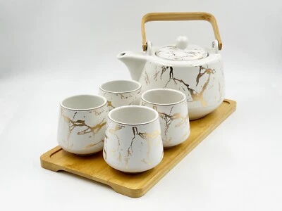 Juego de té de Kung Fu con patrón aleatorio dorado Morden con bandeja de bambú, tetera y tazas de té Foto 1 de 4