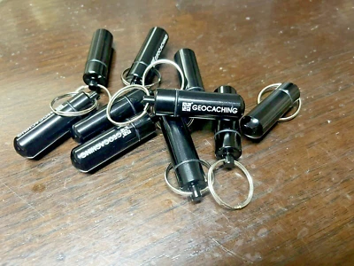 10 X Waterproof Bison Tube Micro Containers With Geocaching Logo - Bulk - Image 1 of 4