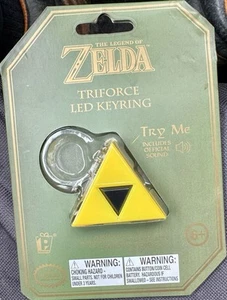 The Legend Of Zelda Triforce LED Schlüsselanhänger gelb Licht & Sound leere Batterien - Bild 1 von 2