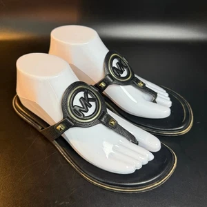 Sandalias de tanga negras con logotipo Michael Kors MK talla 8,5 M detalles dorados - Imagen 1 de 6