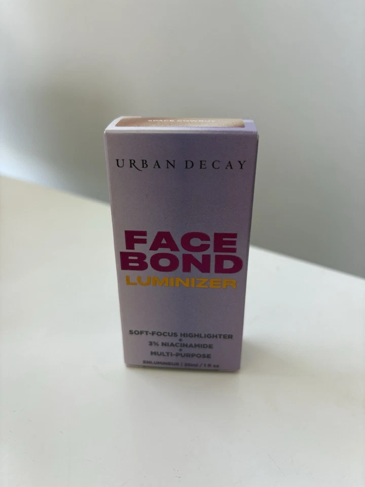 Iluminador Gotas Brillantes Urban Decay Face Bond. Vaquero espacial de sombra. Nuevo en caja Foto 1 de 2