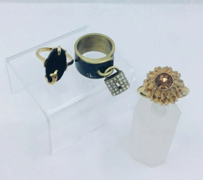 Lot 3 Rings - Black Onyx Sz 6, Band w/ Lock Charm Sz 7.5, & Flower Cocktail Sz 8 - Image 1 of 4