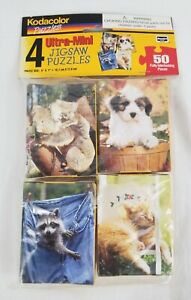 NEW SEALED Kodacolor Ultra Mini 50pc Jigsaw Puzzles 4 Pack Koala Raccoon Dog Cat