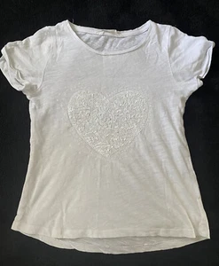 T-shirt bianca paillettes cuore per bambina taglia 6-8 Y - Foto 1 di 3