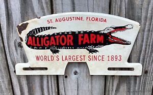 Rusty Stamped Largest Alligator Farm Souvenir Fan Tail Tin License Topper Sign