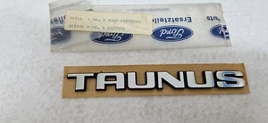 Original FORD OE Schriftzug Emblem Badge Nameplate TAUNUS 80bbf42528ba 6077955 - Bild 1 von 1