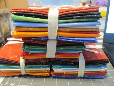 LOT OF 4 FAT QUARTER BUNDLES 10 IN EACH BUNDLE KIND OF LIKE A PAINT SPLATTERED - Image 1 of 4