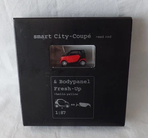 Modelo publicitario Busch / MCC 1:87 Smart City-Coupe rojo loco y panel corporal rojo fresco - Imagen 1 de 3