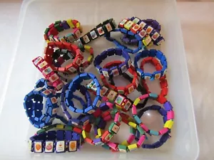 BRACCIALI ELASTICIZZATI IN LEGNO PER BAMBINI TARTARUGHE NINJA MUTANTI ADOLESCENTI VARI COLORI. - Foto 1 di 3