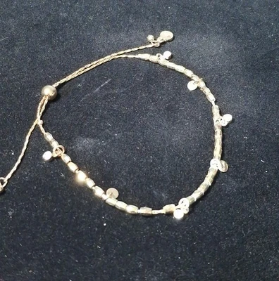 Brazalete ajustable Liz Calboune tono dorado  Foto 1 de 4