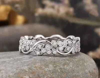 Anillo de compromiso de eternidad de diamantes simulados redondos de 2 quilates enchapado en oro blanco de 14 k Foto 1 de 4