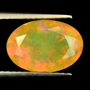 1,63 quilates atractivo ovalado (10 x 7 mm) multicolor llamativo discoteca facetado ópalo natural - Imagen 1 de 5