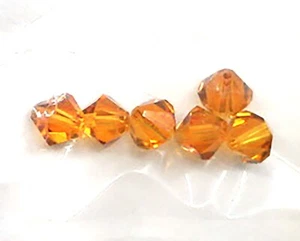 SWAROVSKI BICONE TOPACIO GENUINO CRISTALES AUSTRIACOS 6 PIEZAS CUENTAS 6MM 24269-11 - Imagen 1 de 5