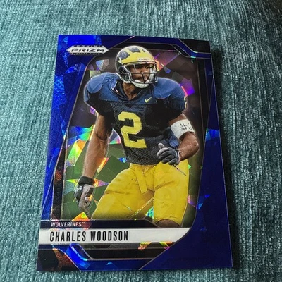 Selecciones de draft Panini Prizm 2025 #183 Charles Woodson Blue Ice Prizm/149 Michigan Foto 1 de 3