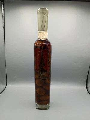 Botella decorativa aceite y vinagre pimienta y aceitunas Foto 1 de 4