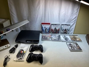 Sony PS3 Slim 150GB CECH-2501A Black Console Bundle 2 Controllers 8 Games Cords - Picture 1 of 21