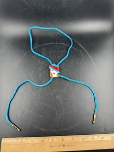 Plastic Mysterious Woman Bolo Tie Turquoise Blue - Picture 1 of 4