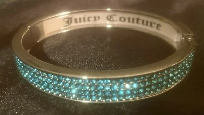 Brazalete con bisagras Juicy Couture azul aguamarina estrás tono plata 7" Foto 1 de 2