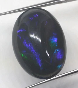 Cabujón ovalado Etiopía WELO ÓPALO NEGRO AHUMADO 8,55 quilates - Imagen 1 de 9