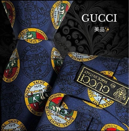 Gucci accessorio abito uomo cravatta a pois in seta marina modello elegante 