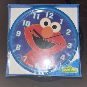 Vintage Elmo Sesamstraße Wanduhr blau FUNKTIONIERT - Bild 1 von 2