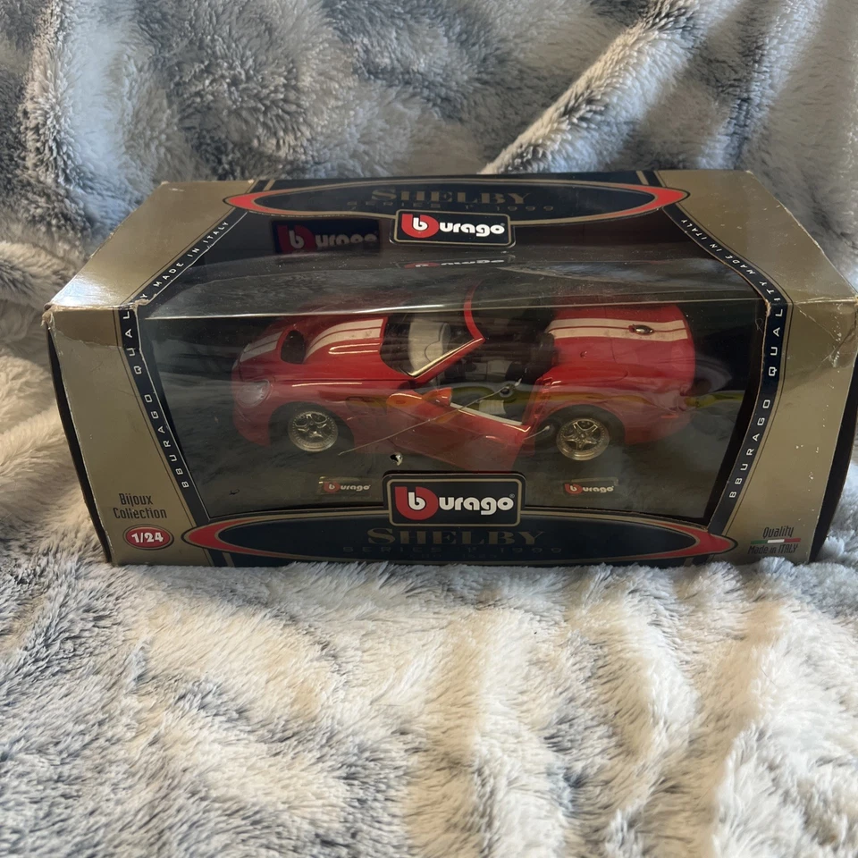 Nuevo en caja Bburago Bijoux Collection 1:24 Die Cast 1999 Shelby Serie 1 Roadster Foto 1 de 4