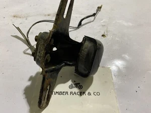 YAMAHA XS360 XS 1976-77 LICENCE PLATE MOUNT BRACKET WITH LIGHT 1A8-84751-60-33 - Picture 1 of 7
