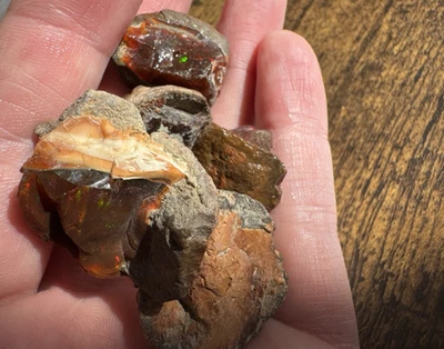 Shewa Schokoladen Opale roh Lot 168,9 ct mit Feuer - Bild 1 von 4