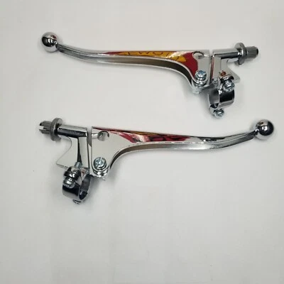PALANCAS DE EMBRAGUE Y FRENO CROMADAS CON EXTREMO DE BOLA TRIUMPH PARA MOTO SE ADAPTA A BARRAS DE 7/8" Foto 1 de 4