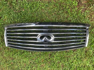 2011 - 2012 INFINITI QX56 ПЕРЕДНЯЯ РЕШЕТКА В КОМПЛЕКТЕ БЕЗ КАМЕРЫ OEM 62310-1LA1A - Изображение 1 из 4