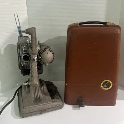 Винтажный 8 мм пленочный проектор Revere с оригинальным корпусом модель 85 лампа/мотор работает - Изображение 1 из 4