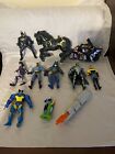 Lot of Batman action figues, horse and Batman on motorcycle