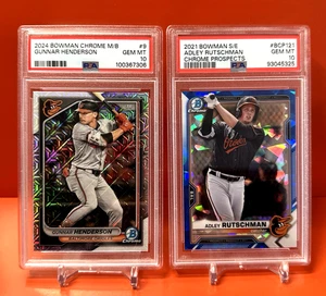 Gunnar Henderson M/B Chrome & Adley Rutschman Sapphire "2 PSA 10! Lote de tarjetas" - Imagen 1 de 4
