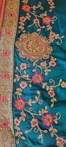 Brand new, beautiful teal blue/green coloured, pure silk saree with gold tassles - Picture 1 of 5