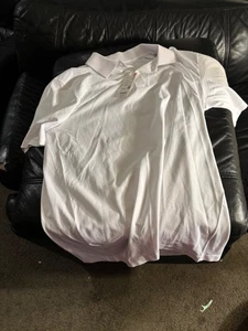 Polo bianca UNIQLO nuova con etichette $30 Large bianca come nuova asta guardaroba studio - Foto 1 di 6