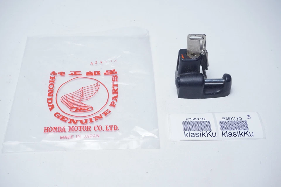 Soporte para casco Honda C50 CB100 125 CG110 125 JX110 125 SL100 125 XL10 bloqueo de suspensión Foto 1 de 4