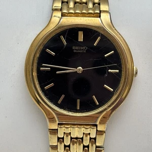 Neo Vintage Seiko V701 6k69 goldfarbene Dresswatch neue Batterie schwarzes Zifferblatt Quarz - Bild 1 von 14