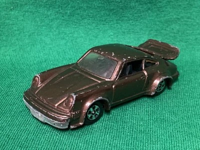 Отдельный винтажный литой автомобиль ERTL PPORSCHE 930 TURBO - гонконгское основание коричневый 1/64 - Изображение 1 из 4