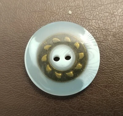 15/16" White and Transluscent two-hole button with metal ring inset. - Image 1 of 3